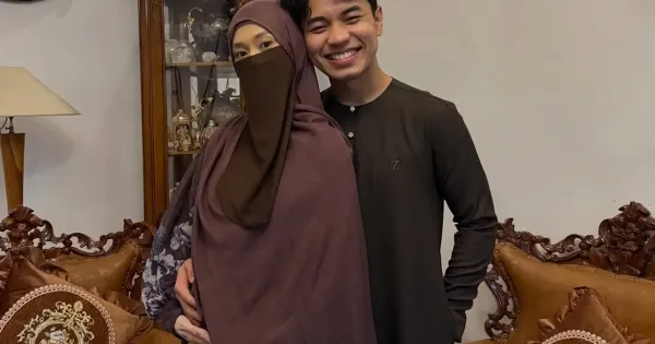 Fiki Naki bersama istri Tina Agustin Fiki Naki bersama istri Tina Agustin