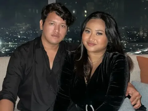 Maria Simorangkir dan Michael Panjaitan
