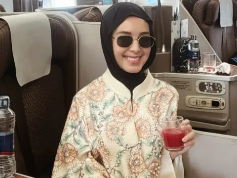 Claudia andhara umrah