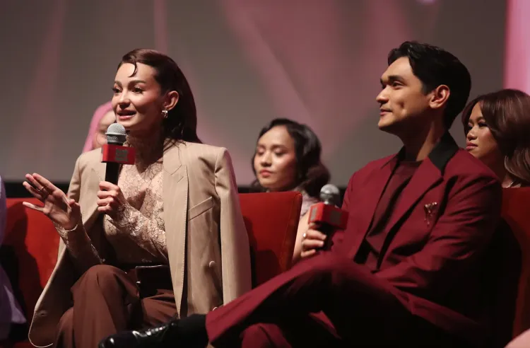 Enzy Storia bersama Afgan di Gala Premiere Agensi Rumah Tangga