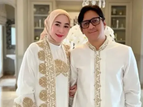 Erin dan Andre Taulany