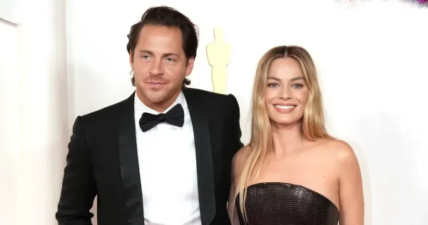 Tom Ackerley dan Margot Robbie Tom Ackerley dan Margot Robbie