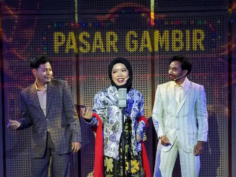 Orkes Lief Java_Kartolo_Roekiyah dan Ismail Marzuki_tampil di Pasar Malam Gambir_acara tahunan bergengsi di Batavia saat itu